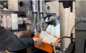 Injection mold for PVC pipe fittings with cooling and venting system